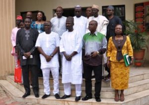 Acting Chairman of the Economic and Financial Crimes Commission, Ibrahim Magu, (middle, front row) with the NEITI delegation during a courtesy visit to the Commission’s Head Office in Abuja. (Pic: EFCC Media & Publicity Unit)