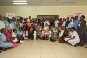 Ninety (99) nurses and retired midwives in a Group Photograph during the Sensitization Forum on Breast Cancer Navigation and Palliative Programme(BCNPP) at the Trauma Centre, National Hospital Abuja. 