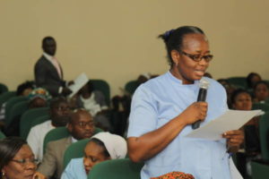 Oncology Nurse asking a question during the Sensitization Forum on Breast Cancer Navigation and Palliative Programme (BCNPP)