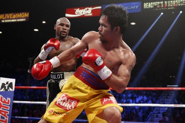 Mayweather beats Pacquiao to unify welterweight titles